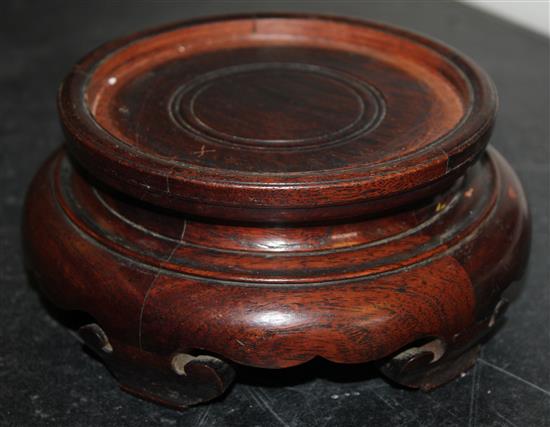 A collection of approximately thirty Chinese and Oriental hardwood stands, largest 18 x 10cm, smallest 3 x 2cm